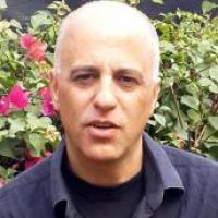 נסים א.